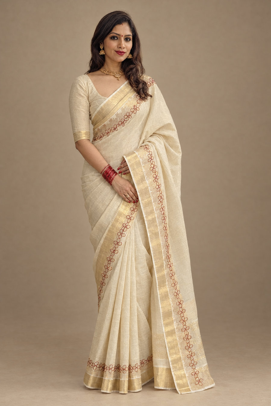 Model wearing the floral Kasavu saree